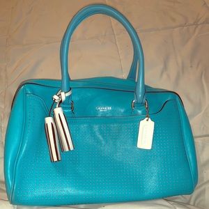 Coach bright blue perforated handbag